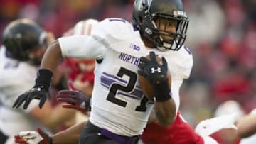 Nov 21, 2015; Madison, WI, USA; Northwestern Wildcats running back Justin Jackson (21) rushes with the football during the second quarter against the Wisconsin Badgers at Camp Randall Stadium. Mandatory Credit: Jeff Hanisch-USA TODAY Spor=