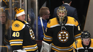 BOSTON - DECEMBER 27: Boston Bruins goalies Tuukka Rask, left, and Jaroslav Halak watch third period action on the bench after Halak was pulled late in the third with the Bruins down 4-2. The Boston Bruins host the New Jersey Devils in a regular season NHL hockey game at TD Garden in Boston on Dec. 27, 2018. (Photo by John Tlumacki/The Boston Globe via Getty Images)
