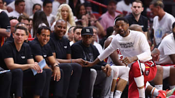 Udonis Haslem #40 of the Miami Heat laughs with head coach Erik Spoelstra(Photo by Michael Reaves/Getty Images)