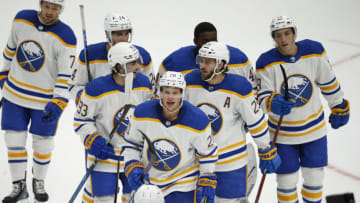 Sep 25, 2022; Washington, District of Columbia, USA; Buffalo Sabres players celebrate after defeating the Washington Capitals in over time at Capital One Arena. Mandatory Credit: Amber Searls-USA TODAY Sports