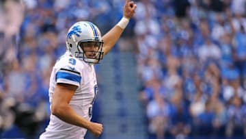 Sep 11, 2016; Indianapolis, IN, USA; Detroit Lions quarterback Matthew Stafford (9) reacts to throwing a touchdown pass to running back Ameer Abdullah (21) in the second half against the Indianapolis Colts at Lucas Oil Stadium. The Lions won 39-35. Mandatory Credit: Aaron Doster-USA TODAY Sports