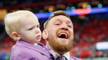 ATLANTA, GA - FEBRUARY 03: Conor McGregor with his son, Conor Jack McGregor Jr., on the field prior to Super Bowl LIII at Mercedes-Benz Stadium on February 3, 2019 in Atlanta, Georgia. (Photo by Kevin C. Cox/Getty Images)