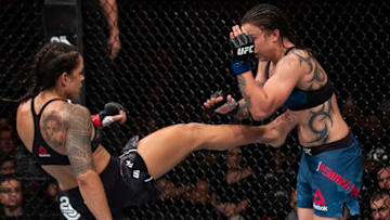 RIO DE JANEIRO, BRAZIL - MAY 12: Amanda Nunes ( L) of Brazil kicks Raquel Pennington of the United States in their women's bantamweight bout during the UFC 224 event at Jeunesse Arena on May 12, 2018 in Rio de Janeiro, Brazil. (Photo by Buda Mendes/Zuffa LLC/Zuffa LLC)