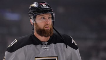 Oct 22, 2016; Los Angeles, CA, USA; Los Angeles Kings defenseman Jake Muzzin (6) looks on before the game against Vancouver Canucks at Staples Center. Mandatory Credit: Jake Roth-USA TODAY Sports