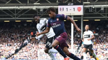 LONDON, ENGLAND - OCTOBER 07: Alex Iwobi of Arsenal takes on Andre-Frank Zambo Anguissa of Fulham during the Premier League match between Fulham FC and Arsenal FC at Craven Cottage on October 7, 2018 in London, United Kingdom. (Photo by David Price/Arsenal FC via Getty Images)