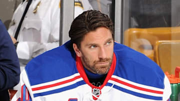 BOSTON, MA - JANUARY 15: Goaltender Henrik Lundqvist #30 of the New York Rangers looks on from the bench during a game against the Boston Bruins at TD Garden on January 15, 2015 in Boston, Massachusetts. (Photo by Steve Babineau/NHLI via Getty Images)