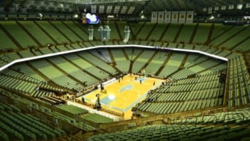 Dec 3, 2014; Chapel Hill, NC, USA; North Carolina Tar Heels fans were given green Tar Heel tshirts that contained recycled material at Dean E. Smith Center. Mandatory Credit: Bob Donnan-USA TODAY Sports