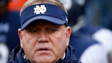NEW YORK, NY - NOVEMBER 17: Head coach Brian Kelly of Notre Dame Fighting Irish stands on the field before their game against Syracuse at Yankee Stadium on November 17, 2018 in New York, New York. (Photo by Jeff Zelevansky/Getty Images)