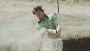 Tom Watson of the United States hitting out of a bunker during the 106th Open Championship on 9th July 1977 on the Ailsa Course at the Turnberry Golf Club in Turnberry, Scotland, United Kingdom. (Photo by Don Morley/Allsport/Getty Images)