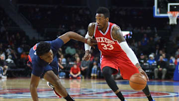 Dec 11, 2016; Auburn Hills, MI, USA; Philadelphia 76ers forward Robert Covington (33) drives to the basket as Detroit Pistons forward Stanley Johnson (7) defends during the third quarter at The Palace of Auburn Hills. Mandatory Credit: Tim Fuller-USA TODAY Sports