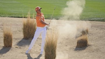 SCOTTSDALE, AZ - FEBRUARY 04: Rickie Fowler hits a shot during the final round of the Waste Management Phoenix Open at TPC Scottsdale on February 4, 2018 in Scottsdale, Arizona. (Photo by Robert Laberge/Getty Images)