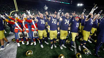 SOUTH BEND, IN - OCTOBER 12: Notre Dame Fighting Irish players celebrate after the game against the USC Trojans at Notre Dame Stadium on October 12, 2019 in South Bend, Indiana. Notre Dame defeated USC 30-27. (Photo by Joe Robbins/Getty Images)