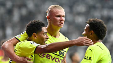 Jude Bellingham celebrates with Erling Haaland and Donyell Malen (Photo by TUR/BSR Agency/Getty Images)