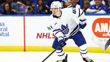 Dec 3, 2022; Tampa, Florida, USA; Toronto Maple Leafs defenseman Mac Hollowell (81) skates with the puck against the Tampa Bay Lightning during the third period at Amalie Arena. Mandatory Credit: Kim Klement-USA TODAY Sports