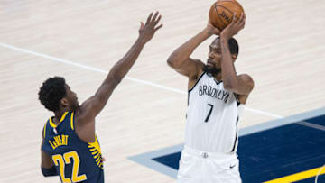 Apr 29, 2021; Indianapolis, Indiana, USA; Brooklyn Nets forward Kevin Durant (7) shoots the ball while Indiana Pacers guard Caris LeVert (22) defends in the third quarter at Bankers Life Fieldhouse. Mandatory Credit: Trevor Ruszkowski-USA TODAY Sports