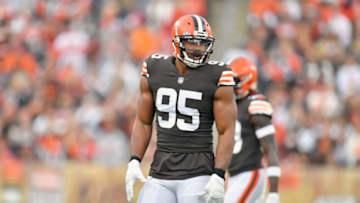CLEVELAND, OHIO - OCTOBER 17: Defensive end Myles Garrett #95 of the Cleveland Browns pauses during the first half against the Arizona Cardinals at FirstEnergy Stadium on October 17, 2021 in Cleveland, Ohio. The Cardinals defeated the Browns 37-14. (Photo by Jason Miller/Getty Images)