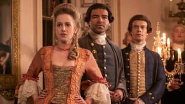 HARLOTS -- Set against the backdrop of 18th century Georgian London, Harlots continues to follow the fortunes of the Wells family. Set a year after the dramatic events of Season 2, Margaret (Samantha Morton) has been sent to America in chains and Lydia Quigley (Lesley Manville) is vanquished and in Bedlam. It seems that the Wells girls can finally free themselves of their motherÕs feud, helped by allies such as Lady Fitz (Liv Tyler). But Charlotte Wells (Jessica Brown-Findlay) soon learns that running a lucrative brothel brings enemies as well as friends, including new pimp in town Isaac Pincher (Alfie Allen). Meanwhile Lydia still finds a way to bite, even in her darkest hour. Emily (Holli Dempsey), Hal (Ash Hunter), and Isaac (Alfie Alan), shown. (Photo by: Liam Daniel/Hulu)