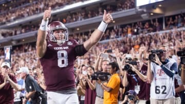 Oct 8, 2016; College Station, TX, USA; Texas A&M Aggies quarterback Trevor Knight (8) scores the winning touchdown against the Tennessee Volunteers during the game at Kyle Field. The Aggies defeat the Volunteers 45-38 in overtime. Mandatory Credit: Jerome Miron-USA TODAY Sports