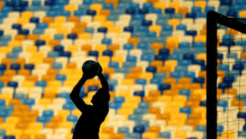 KIEV, UKRAINE - MAY 25: A silhouetted Simon Mignolet of Liverpool in action during a Liverpool training session ahead of the UEFA Champions League Final against Real Madrid at NSC Olimpiyskiy Stadium on May 25, 2018 in Kiev, Ukraine. (Photo by David Ramos/Getty Images)