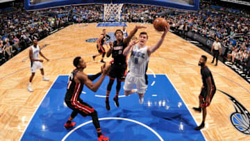 ORLANDO, FL - MARCH 3: Mario Hezonja #8 of the Orlando Magic shoots the ball against the Miami Heat on March 3, 2017 at the Amway Center in Orlando, Florida. NOTE TO USER: User expressly acknowledges and agrees that, by downloading and or using this Photograph, user is consenting to the terms and conditions of the Getty Images License Agreement. Mandatory Copyright Notice: Copyright 2017 NBAE (Photo by Fernando Medina/NBAE via Getty Images)