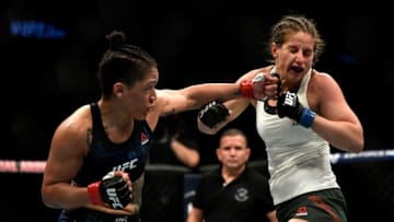 JACKSONVILLE, FLORIDA - MAY 13: Sijara Eubanks (L) of the United States fights Sarah Moras (R) of Canada in their Women's Bantamweight bout during UFC Fight Night at VyStar Veterans Memorial Arena on May 13, 2020 in Jacksonville, Florida. (Photo by Douglas P. DeFelice/Getty Images)