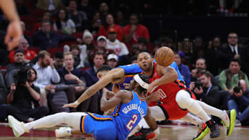 Eric Gordon #10 of the Houston Rockets battles Shai Gilgeous-Alexander #2 of the Oklahoma City Thunder (Photo by Carmen Mandato/Getty Images)