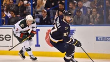 Feb 6, 2016; St. Louis, MO, USA; St. Louis Blues defenseman Alex Pietrangelo (27) controls the puck away from Minnesota Wild center Charlie Coyle (3) during the first period at Scottrade Center. Mandatory Credit: Jasen Vinlove-USA TODAY Sports