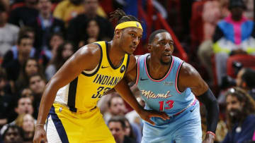 Myles Turner #33 of the Indiana Pacers is defended by Bam Adebayo #13 of the Miami Heat. (Photo by Michael Reaves/Getty Images)