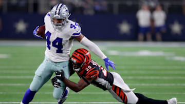 ARLINGTON, TX - AUGUST 18: Darius Jackson #44 of the Dallas Cowboys carries the ball against KeiVarae Russell #20 of the Cincinnati Bengals in the fourth quarter at AT&T Stadium on August 18, 2018 in Arlington, Texas. (Photo by Tom Pennington/Getty Images)