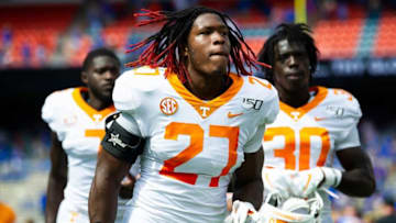 Tennessee linebacker Quavaris Crouch (27), Tennessee wide receiver Brandon Johnson (7) and Tennessee linebacker Roman Harrison (30) run off the field after Tennessee lost 34-3 at Ben Hill Griffin Stadium in Gainesville, Florida on Saturday, September 21, 2019.Volsgators0921