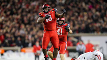 Cincinnati Bearcats defensive lineman Jowon Briggs celebrates sack in American Athletic Conference championship at Nippert Stadium. USA Today.