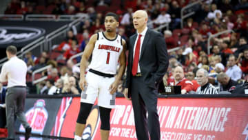 LOUISVILLE, KY - NOVEMBER 08: Chris Mack the head coach of the Louisville Cardinals gives instructions to Christen Cunningham #1 during the game against the Nicholls State Colonels at KFC YUM! Center on November 8, 2018 in Louisville, Kentucky. (Photo by Andy Lyons/Getty Images)