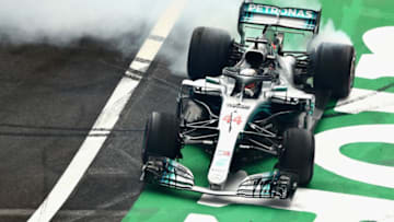 MEXICO CITY, MEXICO - OCTOBER 28: Fourth place finisher Lewis Hamilton of Great Britain and Mercedes GP celebrates winning the 2018 F1 World Drivers Championship by performing donuts during the Formula One Grand Prix of Mexico at Autodromo Hermanos Rodriguez on October 28, 2018 in Mexico City, Mexico. (Photo by Dan Istitene/Getty Images)
