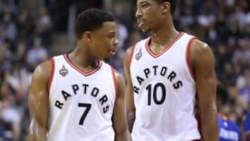 Jan 30, 2016; Toronto, Ontario, CAN; Toronto Raptors point guard Kyle Lowry (7) and guard DeMar DeRozan (10) during their game against the Detroit Pistons at Air Canada Centre. The Raptors beat the Pistons 111-107. Mandatory Credit: Tom Szczerbowski-USA TODAY Sports