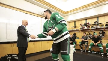 DALLAS, TX - OCTOBER 4: Jim Montgomery, head coach of the Dallas Stars is congratulated on his first win by Stars captain Jamie Benn #14 of the Dallas Stars against the Arizona Coyotes at the American Airlines Center on October 4, 2018 in Dallas, Texas. (Photo by Glenn James/NHLI via Getty Images)