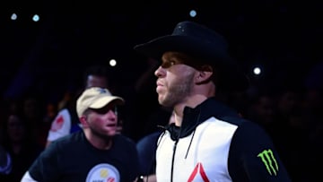 Feb 21, 2016; Pittsburgh, PA, USA; Donald Cerrone (red gloves) walks to the octagon to compete against Alex Oliveira (not pictured) during UFC Fight Night at the Consol Energy Center. Mandatory Credit: David Dermer-USA TODAY Sports