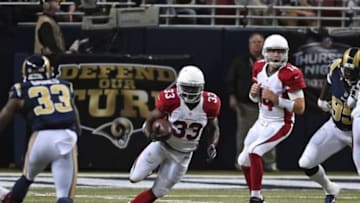 Dec 11, 2014; St. Louis, MO, USA; Arizona Cardinals running back Kerwynn Williams (33) runs the ball against the St. Louis Rams during the second half at the Edward Jones Dome. Mandatory Credit: Jasen Vinlove-USA TODAY Sports