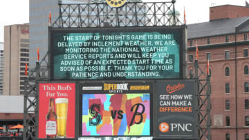 Seattle Mariners and the Baltimore Orioles rain delay. (Mitchell Layton/Getty Images)