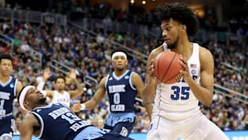 PITTSBURGH, PA - MARCH 17: Marvin Bagley III #35 of the Duke Blue Devils drives to the basket against Stanford Robinson #13 of the Rhode Island Rams during the first half in the second round of the 2018 NCAA Men's Basketball Tournament at PPG PAINTS Arena on March 17, 2018 in Pittsburgh, Pennsylvania. (Photo by Rob Carr/Getty Images)