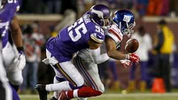 Dec 27, 2015; Minneapolis, MN, USA; Minnesota Vikings linebacker Anthony Barr (55) breaks up a pass intended for New York Giants running back Shane Vereen (34) at TCF Bank Stadium. The Vikings win 49-17. Mandatory Credit: Bruce Kluckhohn-USA TODAY Sports