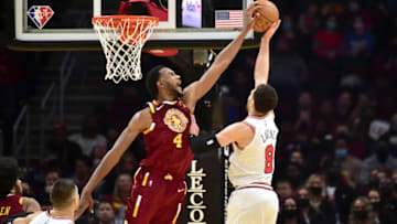 CLEVELAND, OHIO - DECEMBER 08: Evan Mobley #4 of the Cleveland Cavaliers blocks Zach LaVine #8 of the Chicago Bulls during the first half at Rocket Mortgage Fieldhouse on December 08, 2021 in Cleveland, Ohio. NOTE TO USER: User expressly acknowledges and agrees that, by downloading and/or using this photograph, user is consenting to the terms and conditions of the Getty Images License Agreement. (Photo by Jason Miller/Getty Images)