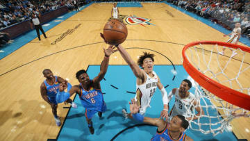OKLAHOMA CITY, OK- NOVEMBER 2: Hamidou Diallo #6 of the Oklahoma City Thunder and Jaxson Hayes #10 of the New Orleans Pelicans went up for a rebound during the game on November 2, 2019 at Chesapeake Energy Arena in Oklahoma City, Oklahoma. NOTE TO USER: User expressly acknowledges and agrees that, by downloading and or using this photograph, User is consenting to the terms and conditions of the Getty Images License Agreement. Mandatory Copyright Notice: Copyright 2019 NBAE (Photo by Zach Beeker/NBAE via Getty Images)