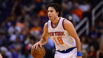 Mar 9, 2016; Phoenix, AZ, USA; New York Knicks guard Sasha Vujacic (18) dribbles the ball against the Phoenix Suns during the second half at Talking Stick Resort Arena. The Knicks defeated the Suns 128-97. Mandatory Credit: Jennifer Stewart-USA TODAY Sports