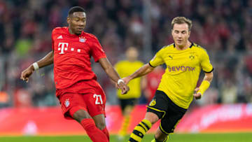 David Alaba, Bayern Munich and Mario Gotze, Borussia Dortmund. (Photo by Boris Streubel/Getty Images)