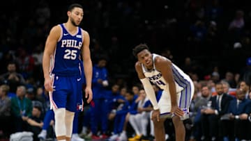 Nov 27, 2019; Philadelphia, PA, USA; Philadelphia 76ers guard Ben Simmons (25) talks with Sacramento Kings guard Buddy Hield (24) during the fourth quarter at Wells Fargo Center. Mandatory Credit: Bill Streicher-USA TODAY Sports