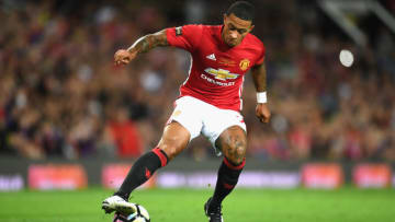 MANCHESTER, ENGLAND - AUGUST 03: Memphis Depay of Manchester United in action during the Wayne Rooney Testimonial match between Manchester United and Everton at Old Trafford on August 3, 2016 in Manchester, England. (Photo by Michael Regan/Getty Images)