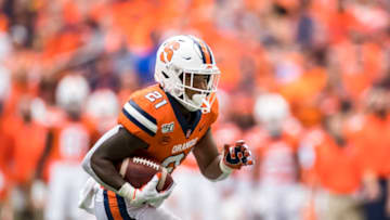 SYRACUSE, NY - SEPTEMBER 21: Moe Neal #21 of the Syracuse Orange carries the ball for a touchdown during the first quarter against the Western Michigan Broncos at the Carrier Dome on September 21, 2019 in Syracuse, New York. (Photo by Brett Carlsen/Getty Images)
