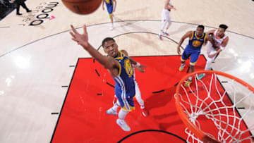PORTLAND, OR - MAY 18: Alfonzo McKinnie #28 of the Golden State Warriors grabs the rebound during the game against the Portland Trail Blazers during Game Three of the Western Conference Finals of the 2019 NBA Playoffs on May 18, 2019 at the Moda Center in Portland, Oregon. NOTE TO USER: User expressly acknowledges and agrees that, by downloading and or using this photograph, user is consenting to the terms and conditions of the Getty Images License Agreement. Mandatory Copyright Notice: Copyright 2019 NBAE (Photo by Sam Forencich/NBAE via Getty Images)