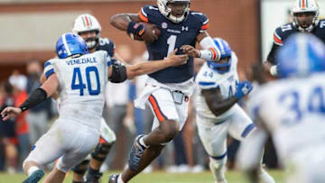 Auburn football quarterback T.J. Finley (1) runs the ball at Jordan-Hare Stadium in Auburn, Ala., on Saturday, Sept. 25, 2021. Auburn Tigers defeated Georgia State Panthers 34-24.