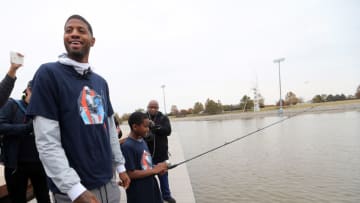 OKLAHOMA CITY, OK - NOVEMBER 13: Paul George of the Oklahoma City Thunder hosted 45 fourth-grade students from the Stanley Hupfeld Academy at Western Village along the Oklahoma River and taught them the techniques of fishing at the Oklahoma Boat House on November 13, 2017 in Oklahoma City, Oklahoma. NOTE TO USER: User expressly acknowledges and agrees that, by downloading and or using this Photograph, user is consenting to the terms and conditions of the Getty Images License Agreement. Mandatory Copyright Notice: Copyright 2017 NBAE (Photo by Layne Murdoch/NBAE via Getty Images)
